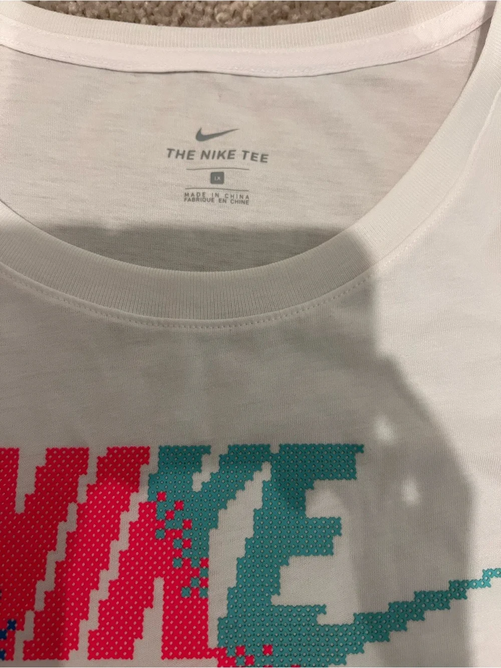Nike White Short Sleeve Tee with Pink & Teal Pixel Graphic